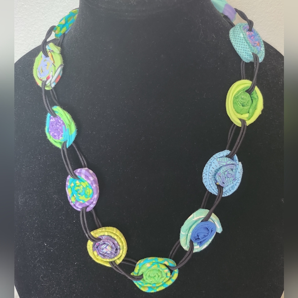 Multi colored coiled fabric necklace